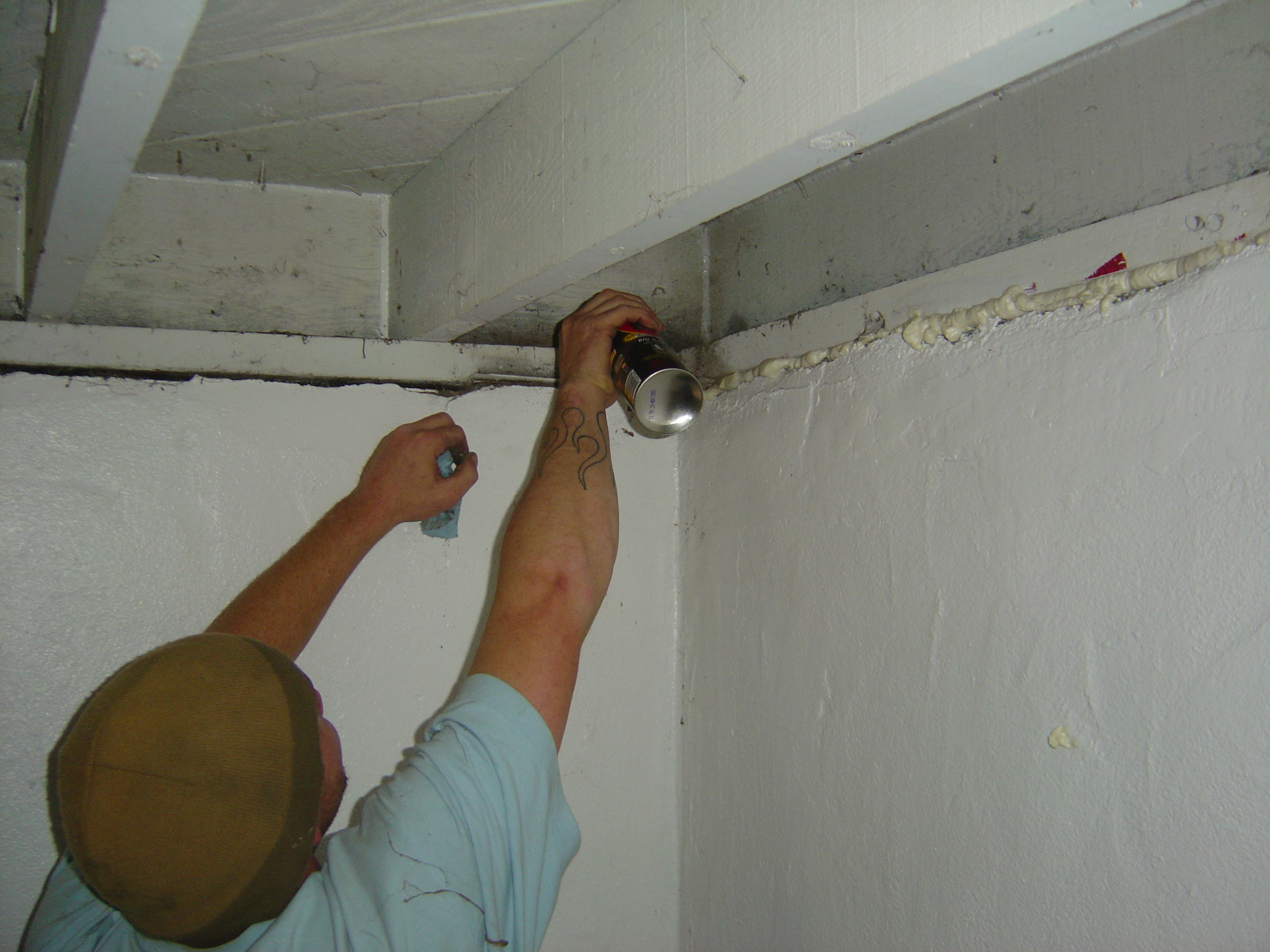 Seal the crack between the sill plate and the foundation wall